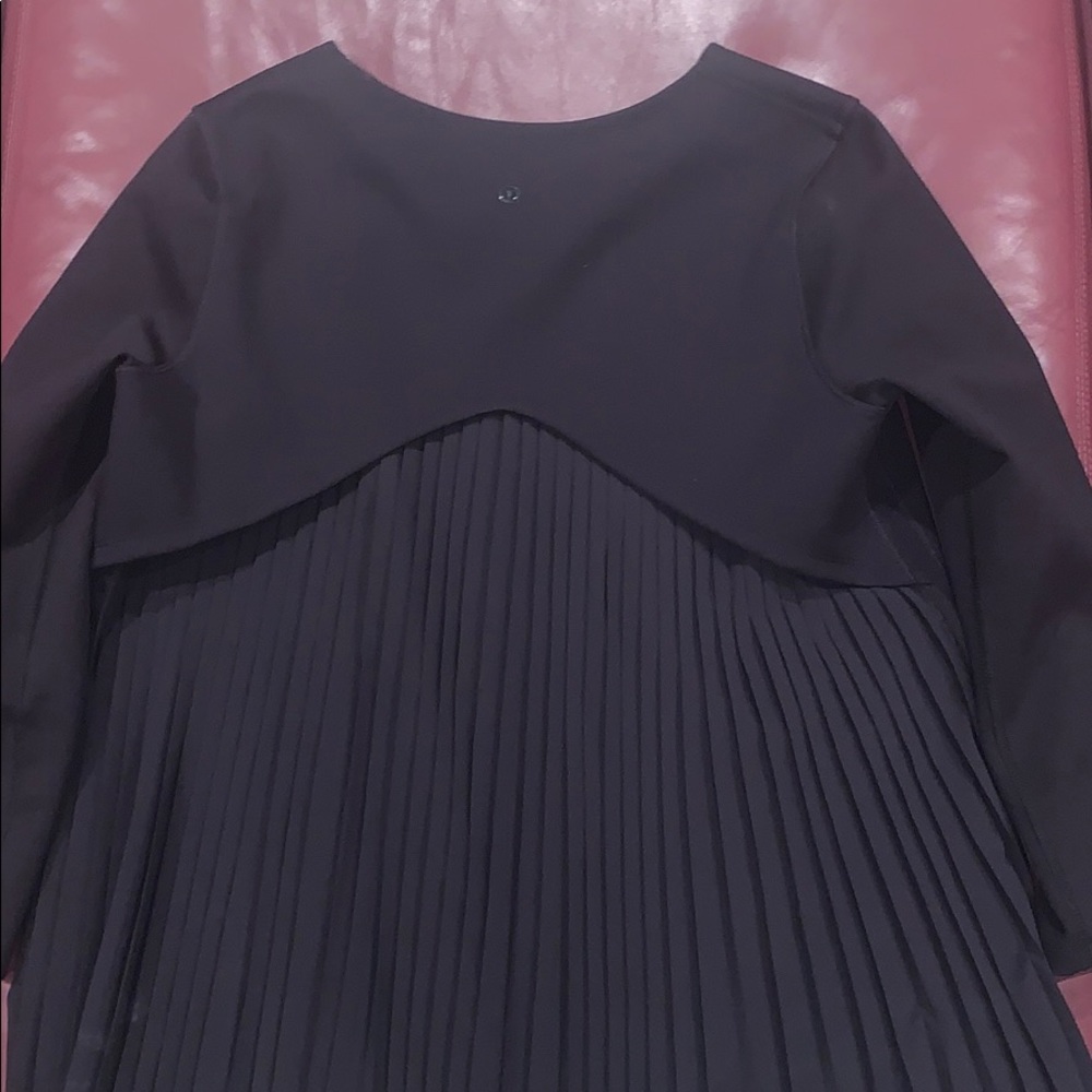 Like new Lululemon ruffle back shirt